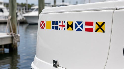 Boat name spelled in signal flag decals