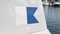 Alfa signal flag decal on a boat console