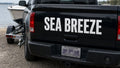 Custom boat name vinyl decal on a truck